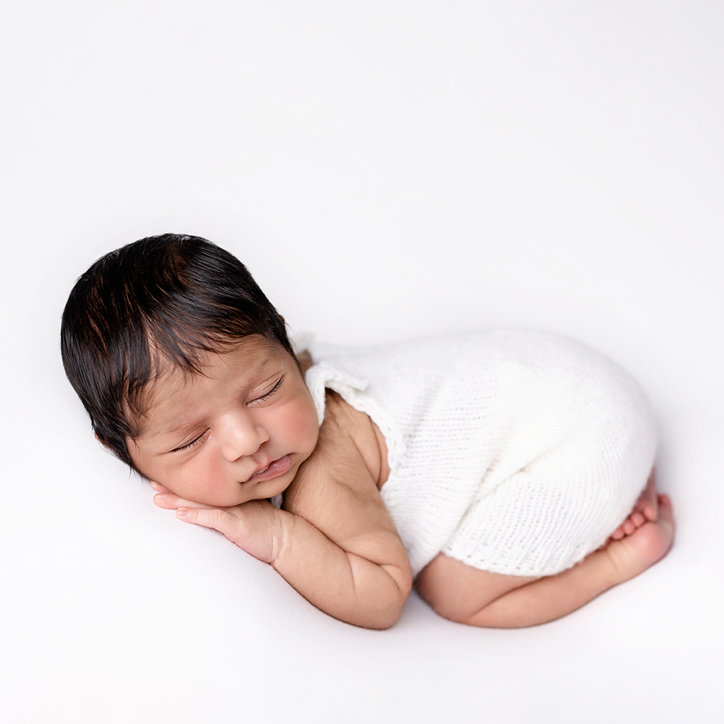 baby photography boy sleeping on white simple natural newborn photoshoot St Albans, Hertfordshire